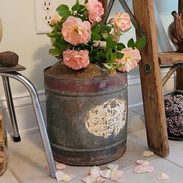 Wheeling Corrugating Company Vintage Gas Can. Imperfectly Charming Decor; dented and rusty and delightful! Missing cap, makes rustic vase!