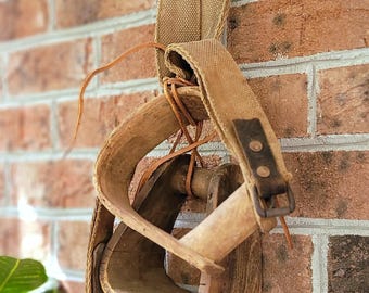 Antique Wooden Mismatched Stirrups with belt/strap and rawhide string. Amazing Rustic Country/Western/Farmhouse Style wall or table decor