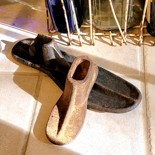 Pair of Cast Iron Cobblers' Shoe Molds, Child/Small and Adult/Large Size. Uncertain of age,  Vintage or antique? Unmarked primitive tools.