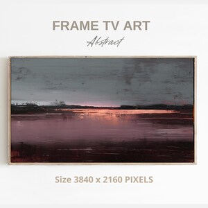 May include: Abstract landscape painting for Frame TV Art. The artwork features a muted colour palette with a dark grey sky and a pinkish-purple body of water. The text "FRAME TV ART" and "Abstract" are displayed at the top.