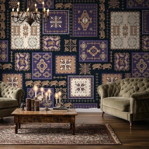 May include: A living room with a patterned wallpaper in navy, purple, and tan squares. Two olive green tufted armchairs and a wooden coffee table are in front of the wall. A chandelier hangs above.