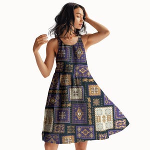 May include: A sleeveless dress with a patchwork design in purple, gold, and cream squares. The dress has a flared skirt and a scoop neckline. The pattern includes geometric and floral motifs.