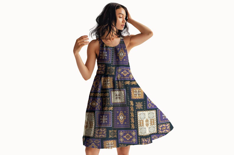 May include: A sleeveless dress with a patchwork design in purple, gold, and cream squares. The dress has a flared skirt and a scoop neckline. The pattern includes geometric and floral motifs.