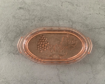 Pink press glass dish with vines