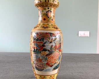 Antique Chinese porcelain vase decorated with birsd and flowers in yellow and gold