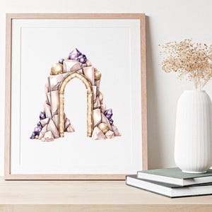 May include: A framed print featuring a watercolor illustration of a fantasy archway. The arch is constructed of light-colored stone and adorned with purple crystals and golden orbs. The artwork is displayed on a wooden surface, with a white vase and books in the background.