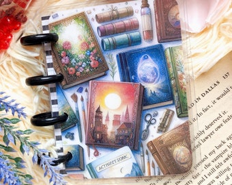 May include: A clear plastic cover with a colourful design of vintage books and illustrations. The cover is for a small, disc-bound planner. The text "ACTISFET SONC" is visible on one of the books.