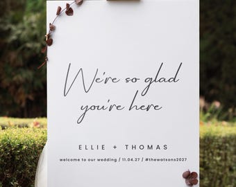 Wedding Welcome Sign – “We’re So Glad You’re Here” Minimal Script – Personalised, Designed, Printed & Delivered (A1 size)