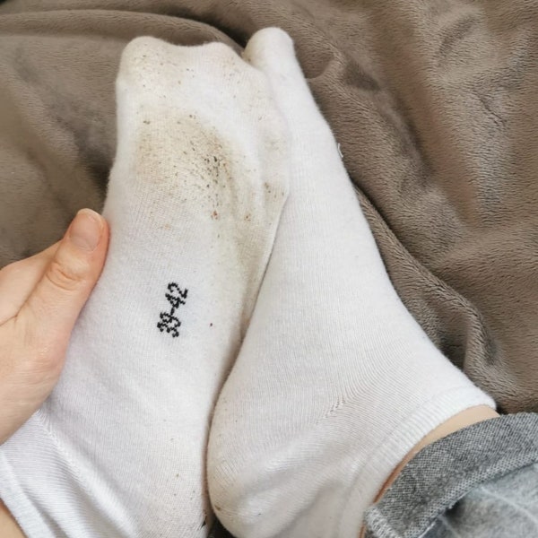 worn socks in white