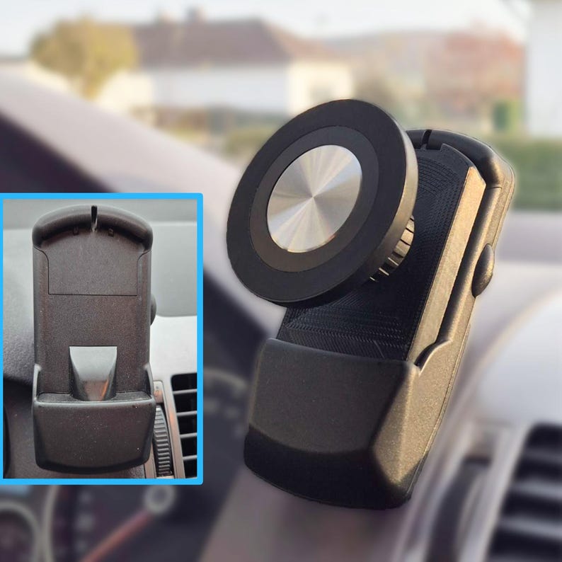 May include: A black car phone mount with a circular magnetic head and a silver center. The mount is attached to a dashboard vent. The phone mount is designed to hold a phone securely while driving.