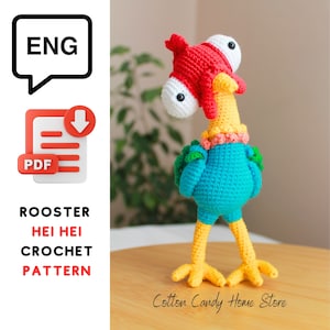 May include: Crochet pattern for a rooster amigurumi toy. The rooster is red, yellow, blue, and green. The pattern is available in English and is a PDF download. The pattern is called "Rooster Hei Hei Crochet Pattern".