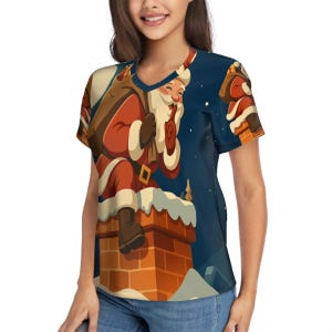 May include: A v-neck t-shirt featuring a festive Christmas design. The shirt displays a cartoon illustration of Santa Claus on a chimney, with a bag of gifts. The background is a dark blue night sky with stars.