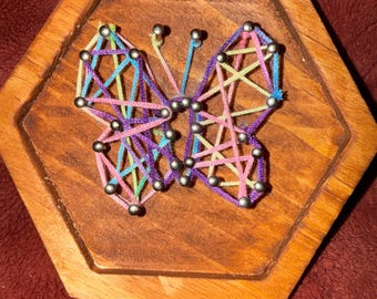 Imán de mariposa