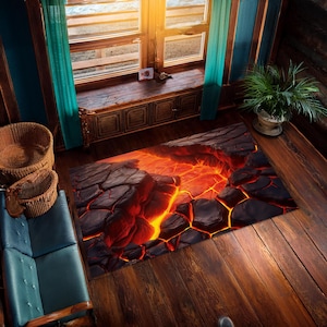 Puede incluir: Una alfombra con una imagen realista de lava fluyendo a través de roca negra agrietada. La alfombra está colocada sobre un suelo de madera en una habitación con una ventana y un sofá.