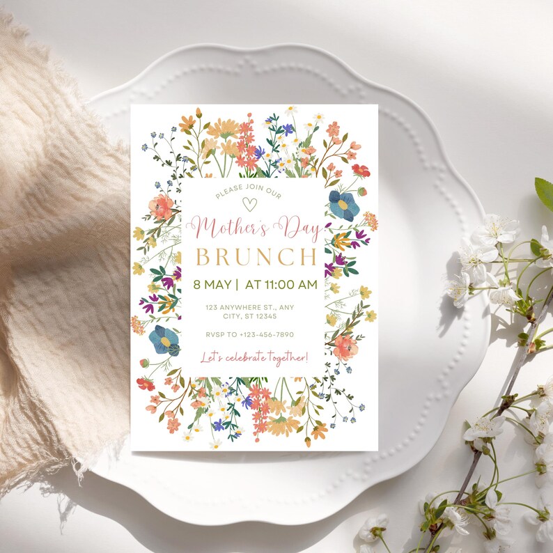 May include: A floral-themed invitation for a Mother's Day brunch. The invitation features a pink heart, the text "Please join our Mother's Day Brunch", the date "8 May", the time "11:00 AM", an address, an RSVP phone number, and the text "Let's celebrate together!"