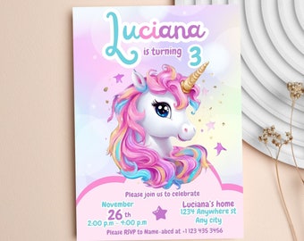May include: A pink and purple unicorn birthday invitation with a rainbow mane and a gold horn. The invitation says "Juciana is turning 3" and includes the date, time, and location of the party.
