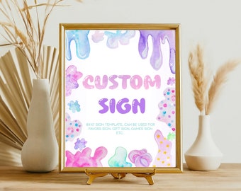 May include: A printable 8x10 inch sign template with a custom sign text overlay. The background features a colorful abstract design with dripping paint and glitter accents. The text "CUSTOM SIGN" is in a bubble font with pink and purple colors.