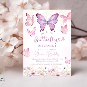 May include: A pink and purple butterfly birthday invitation with gold glitter accents. The invitation says "Our little butterfly is turning 1. Join us to celebrate Olivia's 1st Birthday. Saturday, November 18th, 2:00 to 4:00 pm. 1234 Anywhere st, Any City, ST. Please RSVP to NameABC at 123 435 3456."