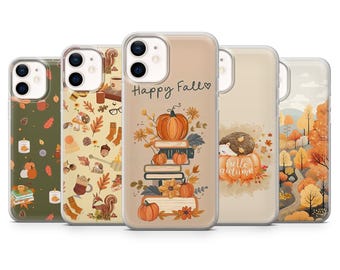 May include: A collection of five phone cases with autumn-themed designs. The cases feature illustrations of pumpkins, leaves, books, and a hedgehog. One case has the text "Happy Fall" and another says "hello autumn".