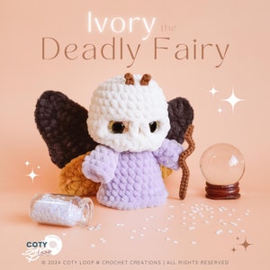 May include: A crocheted fairy doll with the text "Ivory the Deadly Fairy". The doll has a white head, lavender body, and black and gold wings. A glass jar with glitter and a crystal ball are also in the image.