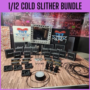 May include: A miniature stage set with the text "1/12 COLD SLITHER BUNDLE". The set includes miniature Marshall amplifiers, speakers, microphones, and a stage backdrop with the band's logo. The stage is set on a wooden surface.