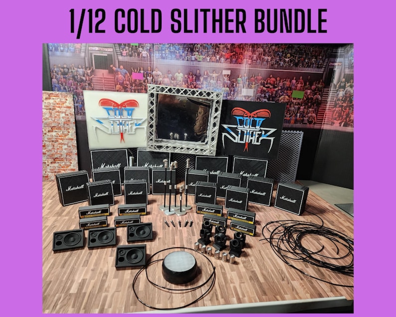 May include: A miniature stage set with the text "1/12 COLD SLITHER BUNDLE". The set includes miniature Marshall amplifiers, speakers, microphones, and a stage backdrop with the band's logo. The stage is set on a wooden surface.