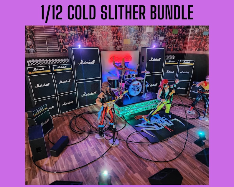 May include: A 1/12 Cold Slither Bundle featuring a miniature rock concert stage. The stage includes Marshall amplifiers, a drum set, and action figures of band members. The stage is set on a wooden floor with a crowd backdrop.