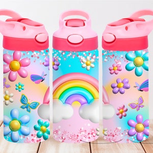 May include: Three pink water bottles with a rainbow, flowers, and butterflies design. The bottles have a pink lid with a carrying handle.