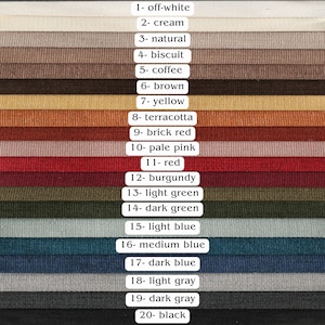 May include: Swatch card displaying 20 fabric samples in a range of colours, including off-white, cream, natural, biscuit, coffee, brown, yellow, terracotta, brick red, pale pink, red, burgundy, light green, dark green, light blue, medium blue, dark blue, light grey, dark grey, and black.