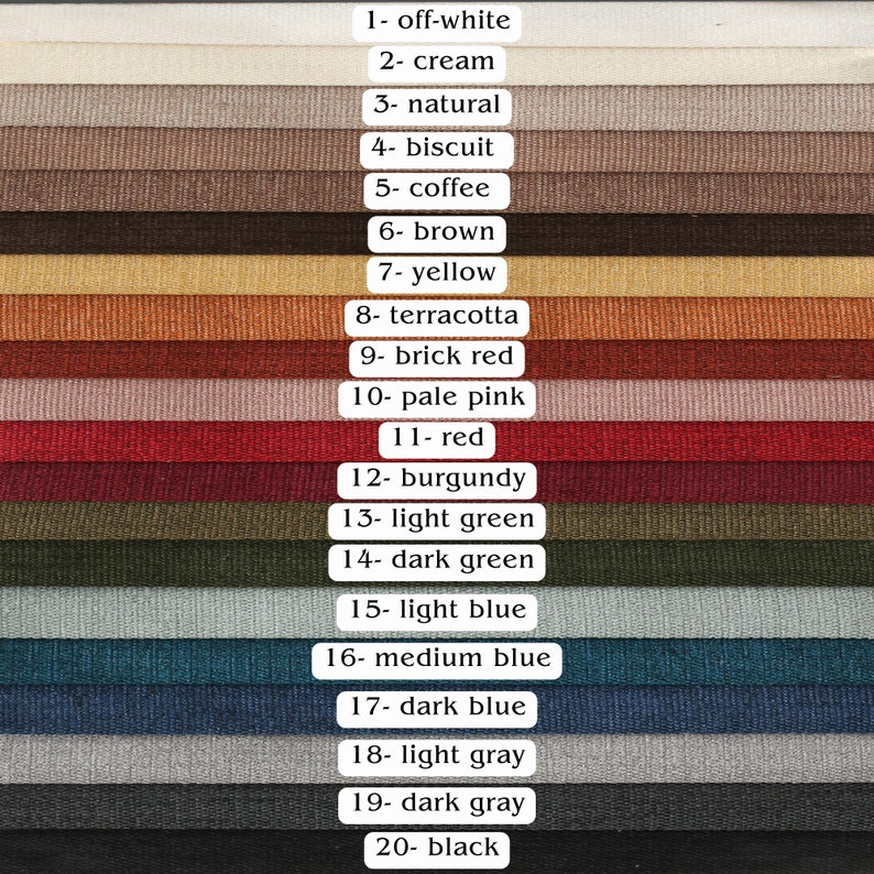 May include: Swatch card displaying 20 fabric samples in a range of colours, including off-white, cream, natural, biscuit, coffee, brown, yellow, terracotta, brick red, pale pink, red, burgundy, light green, dark green, light blue, medium blue, dark blue, light grey, dark grey, and black.
