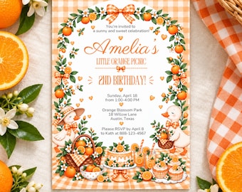 May include: A rectangular invitation card featuring an orange gingham border and a central arch of orange blossoms and fruit. The text reads Amelia's Little Orange Picnic 2nd Birthday, with event details, two illustrated ducks, and a cake.
