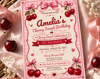 May include: A rectangular birthday invitation card with a pink gingham border, decorated with red cherries and pink bows. The text reads: Amelia's Cherry Sweet Birthday, 1st Birthday, Saturday, August 16, 2027, 2:00 PM - 5:00 PM, Cherry Blossom Hall, 214 Rosewood Avenue, Bloomfield, CA 90218, Cake, treats & sweet party fun!, RSVP by August 1 to Lucy at (555) 318-4421.