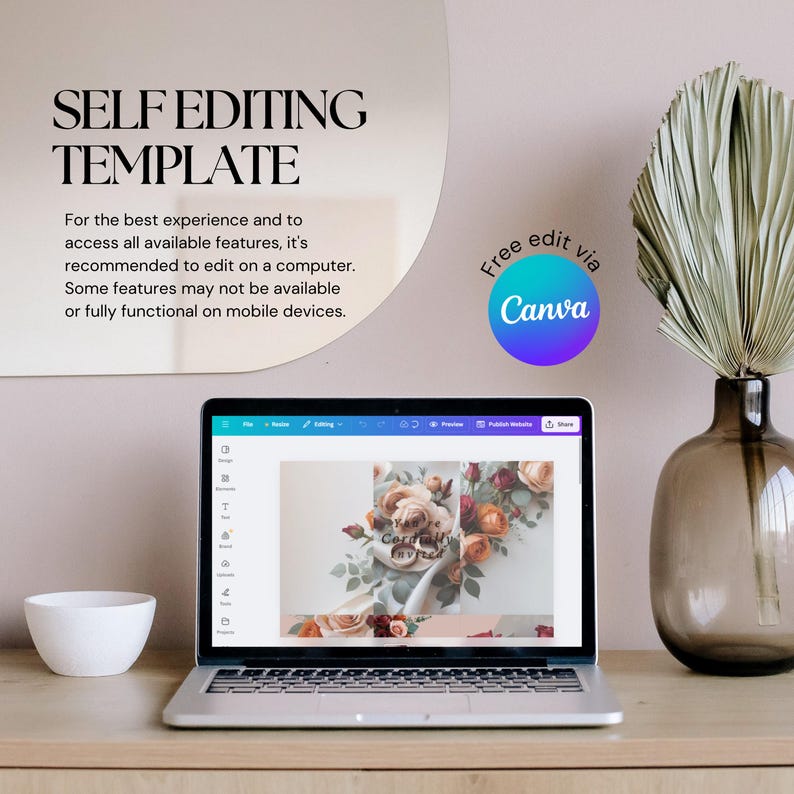 May include: A laptop displaying a floral design template, with the text "SELF EDITING TEMPLATE" at the top. A white bowl and a vase with dried foliage are on the wooden surface. The Canva logo is visible.
