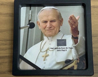 Saint Pope John Paul II hair strands lock relic Catholic Church museum