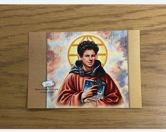 Carlo Acutis hand written relic piece photo display Catholic Church