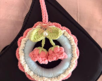かぎ針編みの春の花のリースの手作りの花のリース、母親への