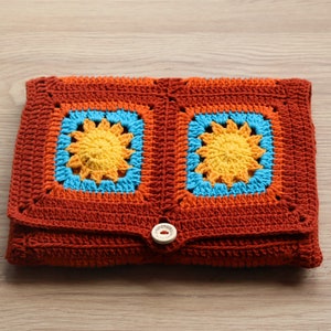 Handmade Crochet Book Cover with Sunburst Design - Red and Orange
