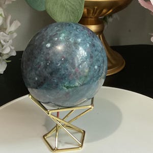 Ruby Kyanite Sphere – 68.8mm (2.71&quot;) – UV Reactive – Energy + Alignment