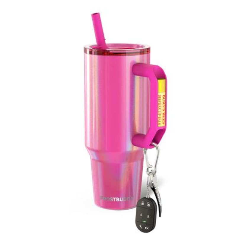 May include: A pink insulated tumbler with a handle and a matching straw. The tumbler has a silver carabiner clip with a car key fob attached. The handle has a yellow tag that reads "BURT'S BEES BEESWAX LIP BALM". The tumbler has the word "FROSTBUDDY" printed on it.