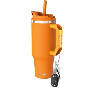 May include: An orange insulated tumbler with a handle, straw, and lid. A Burt's Bees lip balm is attached to the handle. A key fob is attached to the tumbler with a carabiner. The word "FROSTBUDDY" is printed on the tumbler.