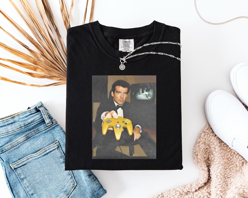 Funny Golden Eye 007 Unisex Garment-Dyed T-shirt Retro Gamer Gift N64 Controller Shirt James Bond Gaming Tee Video Game Clothing image 1
