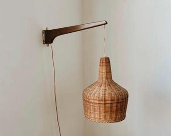 Vintage Mid Century Modern Wicker Hanging lamp with beautiful Teak Wooden Arm