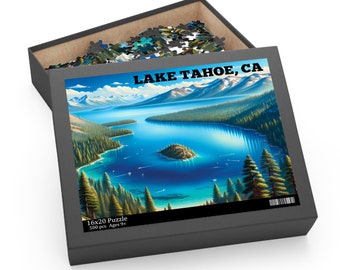 May include: A 500-piece jigsaw puzzle featuring a scenic view of Lake Tahoe, California. The puzzle box is open, revealing the puzzle pieces inside. The box has a black background with the text "LAKE TAHOE, CA" in white letters. The puzzle is recommended for ages 9 and up.