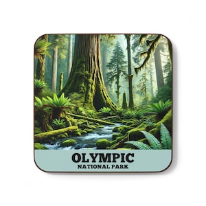 May include: A square coaster with a scenic image of a lush green forest with a stream running through it. The text "OLYMPIC NATIONAL PARK" is printed in black on a light blue background at the bottom of the coaster.