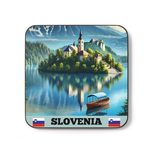 May include: Square coaster featuring a scenic view of Slovenia's Lake Bled, with a church on an island and a boat. The image includes the word "SLOVENIA" and the Slovenian flag.