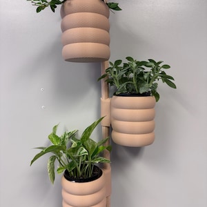 The Bubble Weave Vertical Rail Planter Wall Mounted System by Lofted Goods