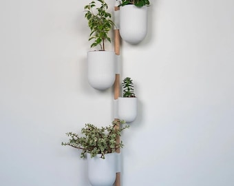 The Ira Vertical Rail Planter: Wall Mounted System by Lofted Goods