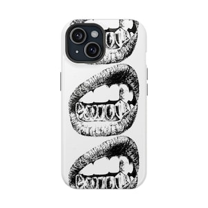 May include: A white iPhone case with a black and white graphic of three sets of lips with gold teeth. The lips are arranged vertically on the case.
