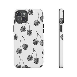Pode incluir: Uma capa de telefone branca com um padrão de cerejas preto e branco. A capa é projetada para um iPhone.