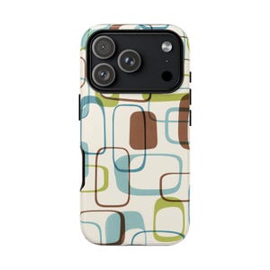 May include: A phone case with a retro design. The case has a cream background with a pattern of rounded rectangles in brown, blue, and green. The phone's camera lenses are visible at the top.